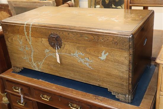 A Chinese pewter inlaid camphorwood trunk W.104cm